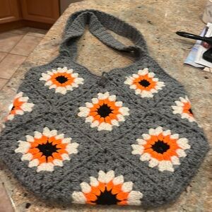 Handmade crochet tote bag with lining.  Button closure